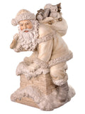 9" RESIN WINTER WHITE SANTA ON CHIMNEY